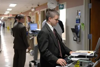 docs-in-hallway-at-computer-stations 1.jpg